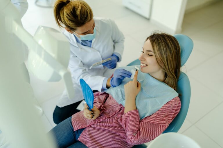 young woman sitting in dental chair and selecting 2021 09 03 03 12 59 utc